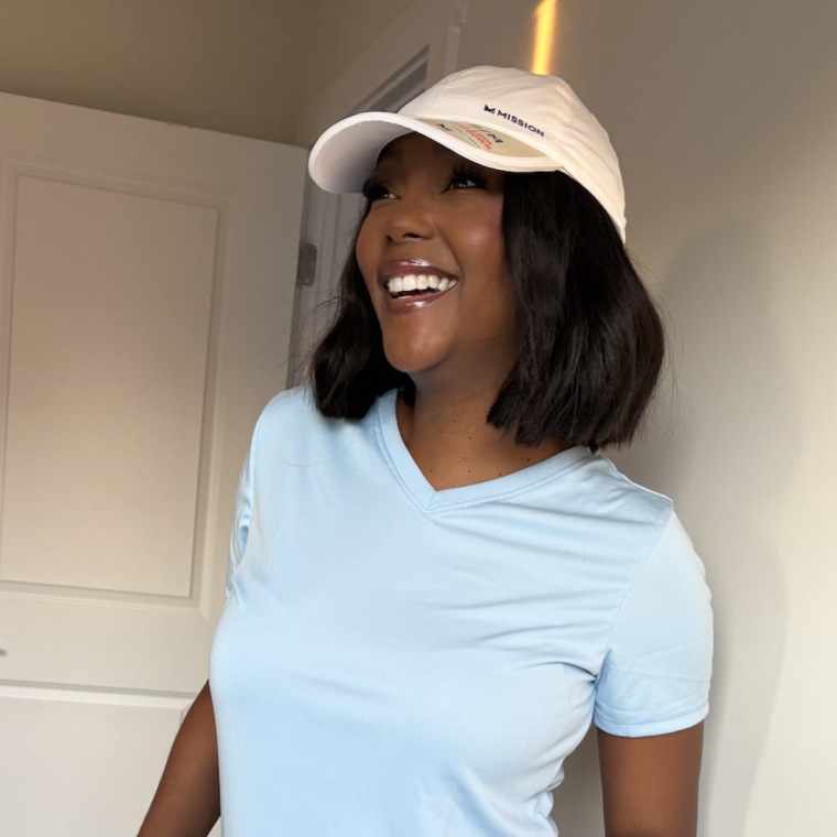 Shop TODAY contributor Makho Ndlovu wears the Mission Cooling UPF Performance Hat.